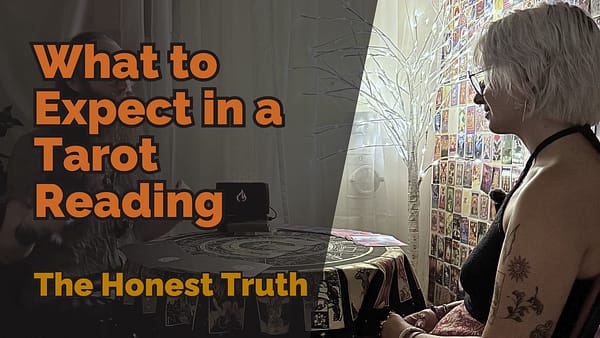 What to expect in a tarot reading: person receiving cards in atmospheric reading room
