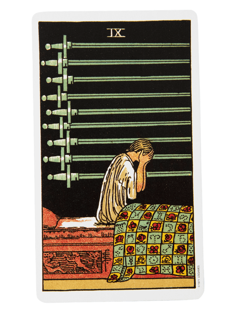 Nine of Swords artwork, deemed the worst tarot card for anxiety, featuring a figure sitting in bed with head in hands, weighed down by troubling thoughts.