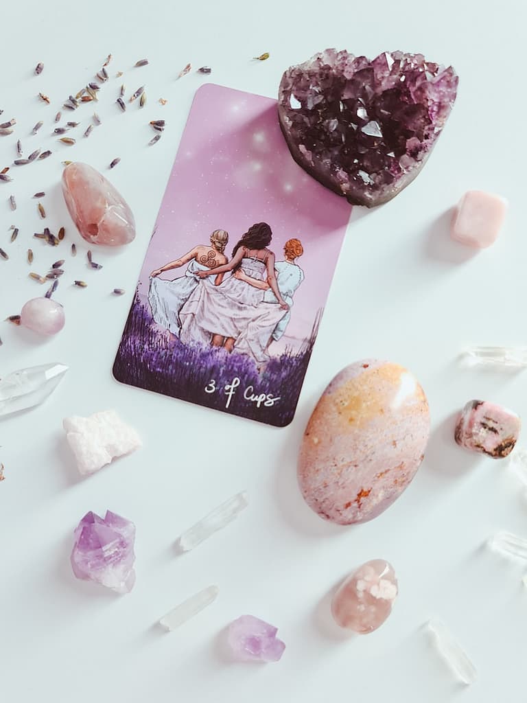 white and pink floral tarot card