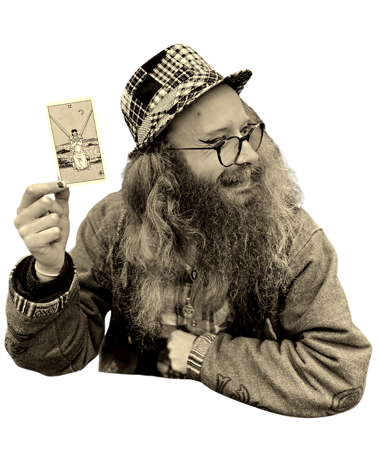 Gord looking towards the right, holding a tarot card