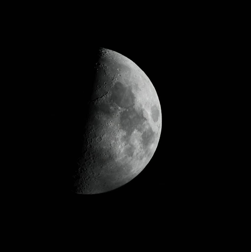 What'S The Best Moon Phase For Tarot Reading? All 8 Ranked A first quarter moon is shown in the dark sky