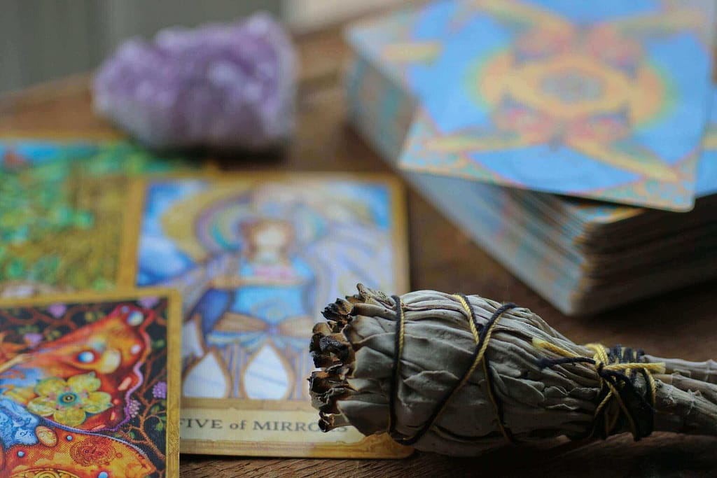 Gray cloth torch, non-binary tarot reader
