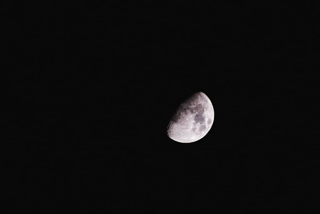 What'S The Best Moon Phase For Tarot Reading? All 8 Ranked A waxing gibbous moon is seen in the dark sky