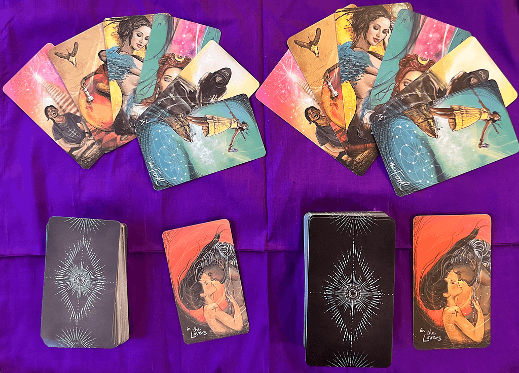 Don’t Get Fooled: 5 Top Tips To Spot Counterfeit Tarot Decks 2 Two tarot decks side by side on a purple cloth. The left deck has muted colors and thinner cards, while the right deck has vibrant colors and thicker cards.
