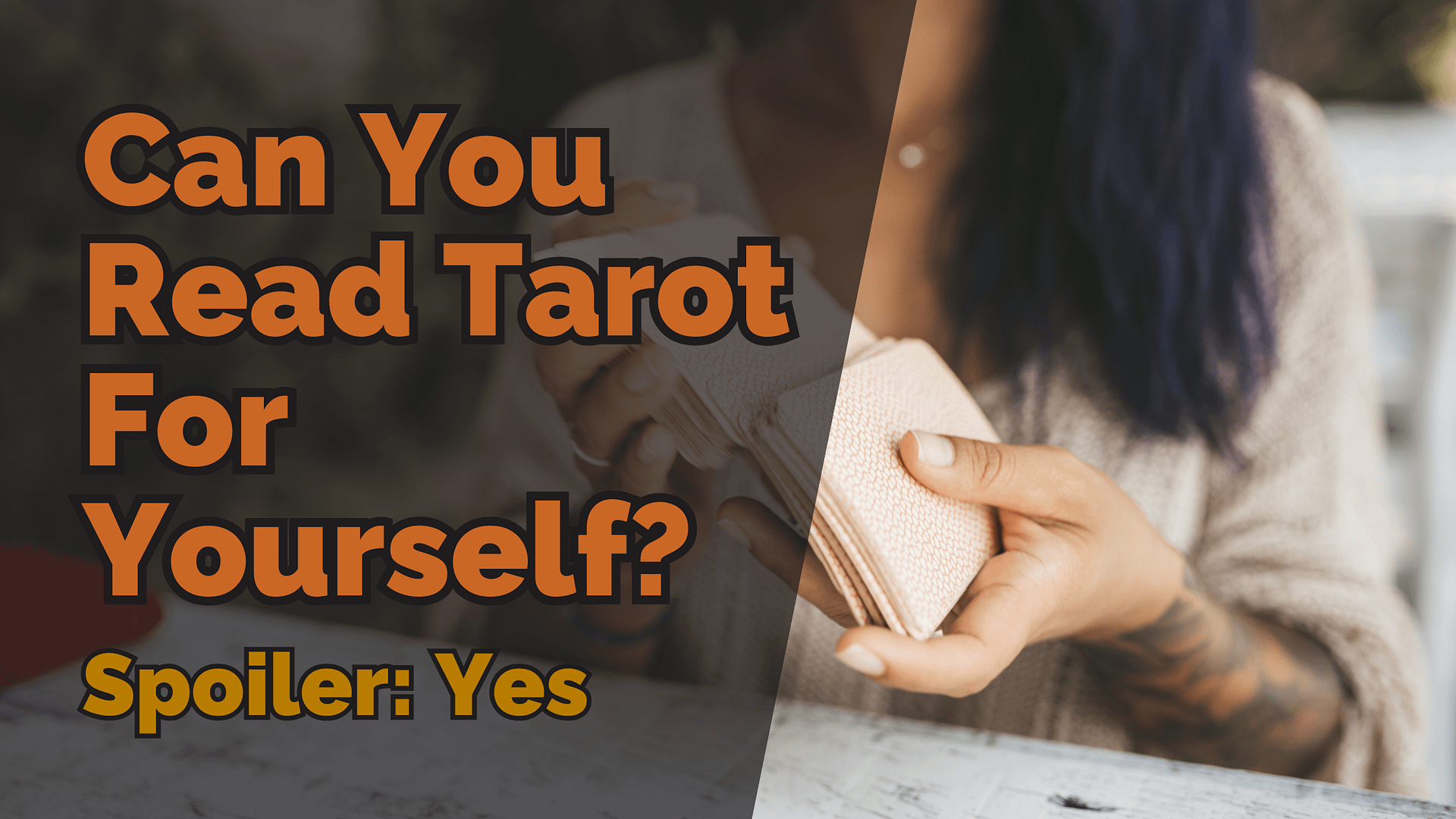 Hands holding a tarot deck on a table, with overlay text “can you read tarot for yourself? Spoiler: yes”