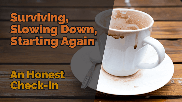 A messy, half-finished cup of hot chocolate or coffee on a white saucer, with smudges and stains around the rim and table. The text ‘surviving, slowing down, starting again: an honest check-in’ is overlaid in bold orange and yellow fonts, set against a wooden background, symbolising pause and reflection.