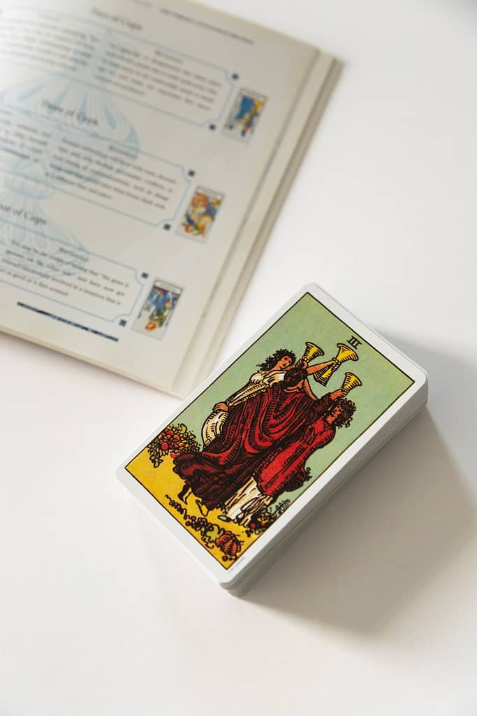 Learn Tarot in Manchester: Simply Tarot Course 1 white and red card on white table