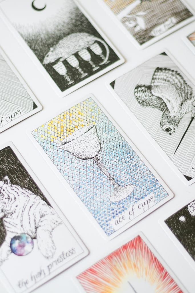 Is Tarot A Closed Practice? No, But These 6 Things Are 3 A bunch of different types of cards on a table