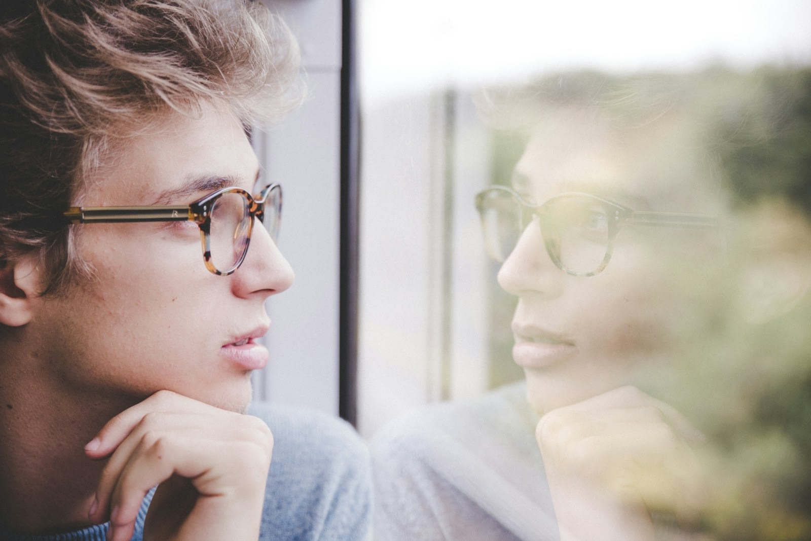Somebody looking at their reflection.